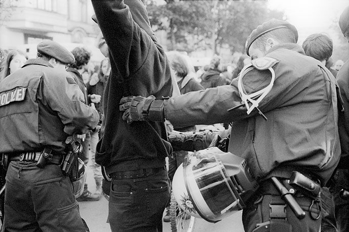 The police check demonstrators for carrying dangerous objects. Image: Michel Meijer