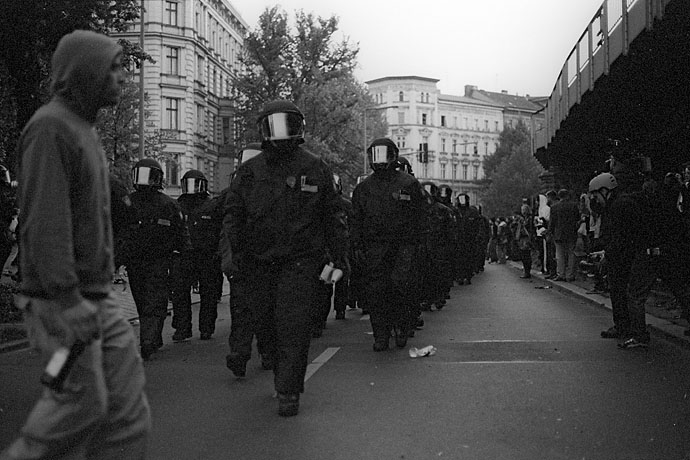 Police units walk to their positions for the start of the demonstration. Image: Michel Meijer