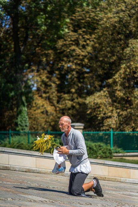 Celebration of Maria ascension in Jasna Góra, Poland 2018. A pilgrim crawls the last few metres to the pilgrimage site of Jasna Góra on his knees. Image: Michel Meijer