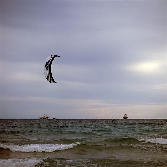 Rice cultivation in Albufera Natural Park, Spain 2014. Shipping and kitesurfing in the Mediterranean off the coast of El Saler. Image: Michel Meijer