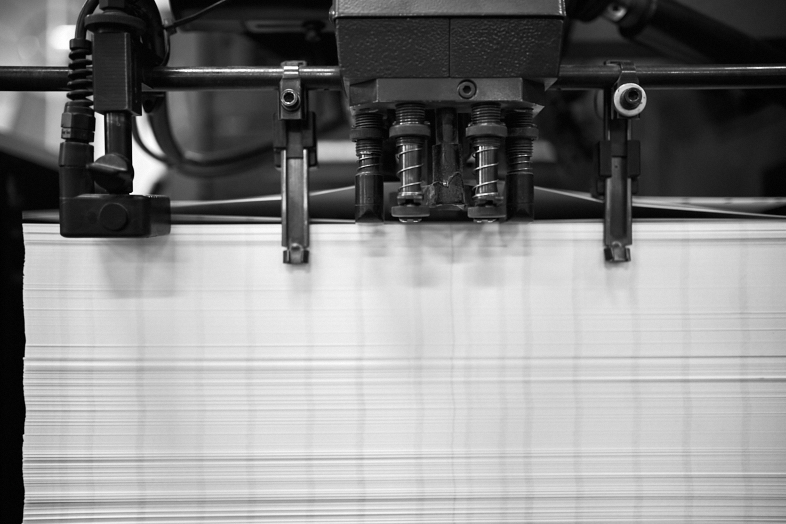 Einführen von Druckbögen in die Druckmaschine Einführen von Druckbögen in die Druckmaschine
