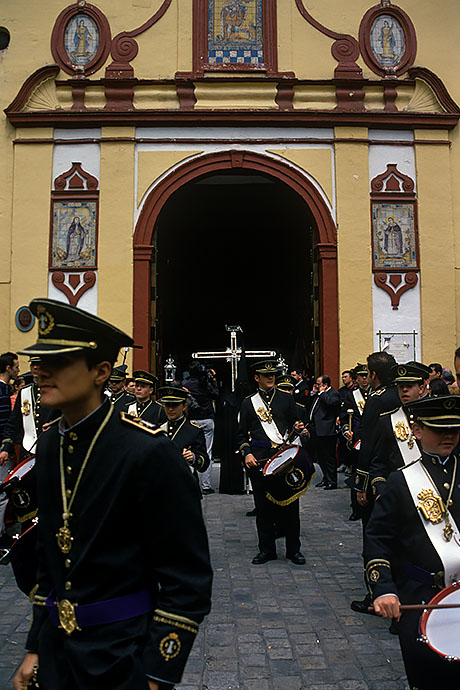 Percussionists of the brass band line up in front of the church from where the procession of their church community begins. Image: Michel Meijer