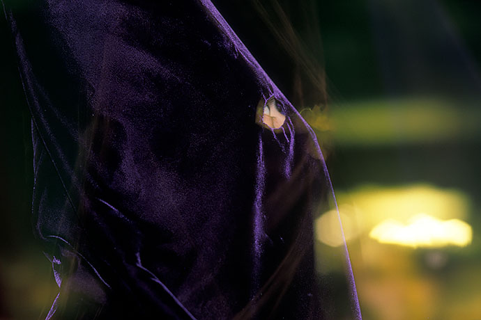 A hooded penitent stands in thought. Image: Michel Meijer